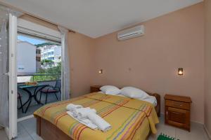 Ein Bett oder Betten in einem Zimmer der Unterkunft Villa Juric