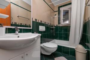 Ein Badezimmer in der Unterkunft Villa Juric