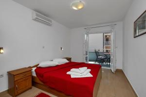 Ein Bett oder Betten in einem Zimmer der Unterkunft Villa Juric