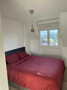 Posteľ alebo postele v izbe v ubytovaní Le P’tit cosy