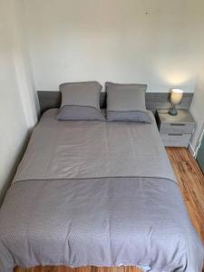 Postel nebo postele na pokoji v ubytování F3 Porticcio proche de toutes commodités avec wifi