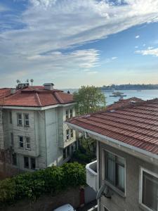 an aerial view of two buildings and the water at The pillo loft in Istanbul