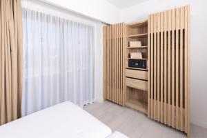 Кровать или кровати в номере Esmeralda Cotillo Homes by LIVVO