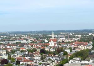 an aerial view of a city with buildings at NEW I GREAT CITY VIEW I 32 FLOOR I BOXSPRINGBED and NETFLIX in Augsburg