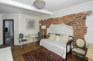 Postel nebo postele na pokoji v ubytování St. Peter's Boutique Hotel