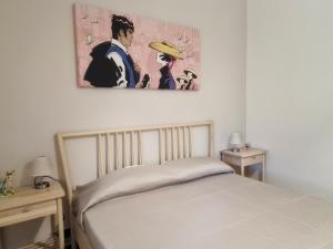 Postel nebo postele na pokoji v ubytování Oltremare