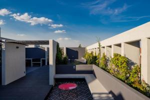 a view of the balcony of a house at NIU Modern & Centric Lofts in Mexico City