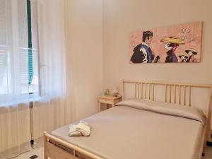 A bed or beds in a room at Oltremare