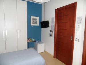Postel nebo postele na pokoji v ubytování B&B Palatium S.G.