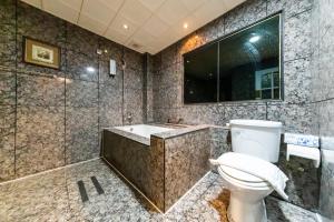 Koupelna v ubytování I HI Sanduo Travel Hotel