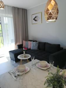Posedenie v ubytovaní Apartament Zielone Wzgórze 2