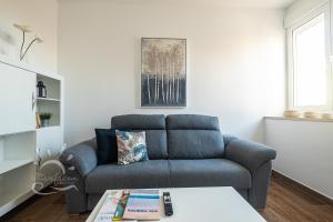 Posedenie v ubytovaní Apartamentos DOM ROOM