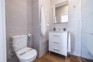 Kúpeľňa v ubytovaní Apartamentos DOM ROOM