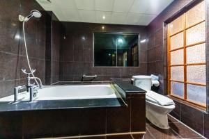 Koupelna v ubytování I HI Sanduo Travel Hotel