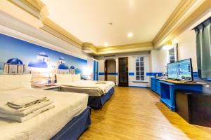 Postel nebo postele na pokoji v ubytování I HI Sanduo Travel Hotel
