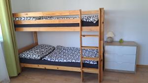 Posteľ alebo postele v izbe v ubytovaní Apartmán Pálenica II