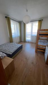 Posteľ alebo postele v izbe v ubytovaní Apartmán Pálenica II