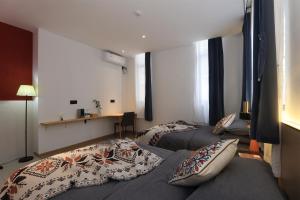 Säng eller sängar i ett rum på Artham hills travel B&B
