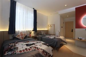 Säng eller sängar i ett rum på Artham hills travel B&B