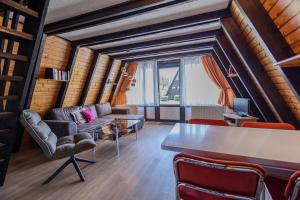 Posezení v ubytování Ferienwohnpark Immenstaad am Bodensee Nurdachhaus Typ 7 ND 30