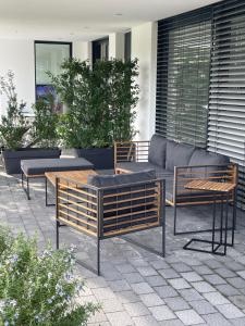 a group of benches and tables on a patio at Traumblick Vallendar 2.0 in Vallendar