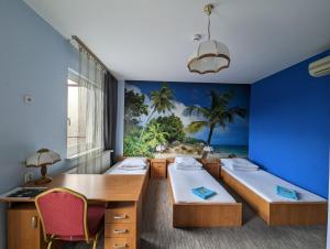 Łóżko lub łóżka w pokoju w obiekcie Motel DRABEK