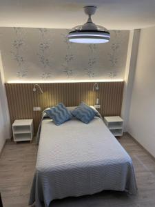Posteľ alebo postele v izbe v ubytovaní Hostal Calderón de la Barca