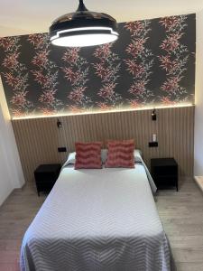 Posteľ alebo postele v izbe v ubytovaní Hostal Calderón de la Barca
