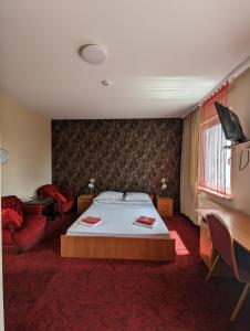 Łóżko lub łóżka w pokoju w obiekcie Motel DRABEK