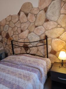 Postel nebo postele na pokoji v ubytování Rocca Pinta Guest House