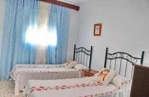 Posteľ alebo postele v izbe v ubytovaní Apartamento Red Rouse