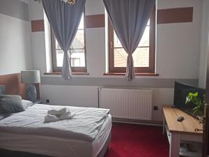 Voodi või voodid majutusasutuse Waldhof toas