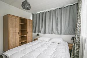 Posteľ alebo postele v izbe v ubytovaní Appartement au cœur d'Etretat avec parking gratuit