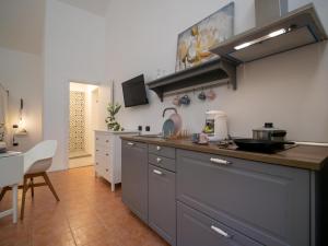 Kuchyň nebo kuchyňský kout v ubytování Locanda dei Sette Limoni - camere e residence