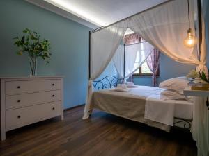 Postel nebo postele na pokoji v ubytování Locanda dei Sette Limoni - camere e residence