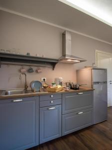 Kuchyň nebo kuchyňský kout v ubytování Locanda dei Sette Limoni - camere e residence