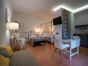 Postel nebo postele na pokoji v ubytování Locanda dei Sette Limoni - camere e residence