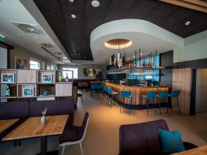 Posezení v ubytování freilich. Bistro. Bar. Hotel - digitaler self check in