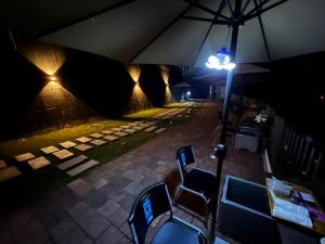 Ein Sitzbereich in der Unterkunft One Roll Stone Homestay