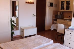 Postel nebo postele na pokoji v ubytování Rooms and Apartments Robert