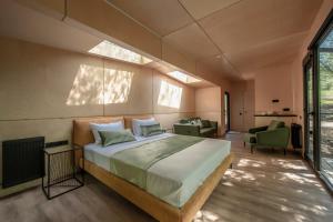 Postel nebo postele na pokoji v ubytování Kiketi Farm Hotels