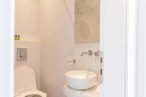 Kúpeľňa v ubytovaní Asimina Hotel