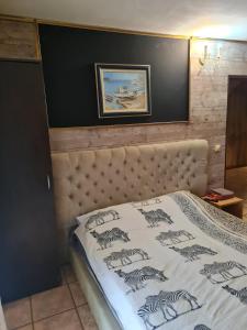 Postel nebo postele na pokoji v ubytování Guest House Maja