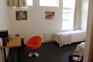 Postel nebo postele na pokoji v ubytování Höfn Inn Guesthouse
