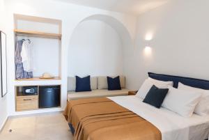 Posteľ alebo postele v izbe v ubytovaní Asimina Hotel