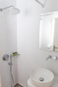 Kúpeľňa v ubytovaní Asimina Hotel
