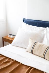 Posteľ alebo postele v izbe v ubytovaní Asimina Hotel