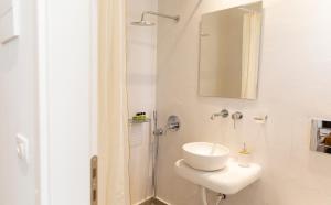 Kúpeľňa v ubytovaní Asimina Hotel