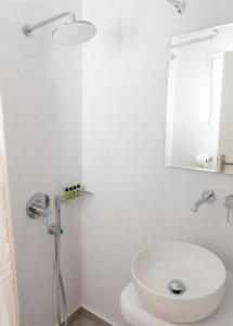 Kúpeľňa v ubytovaní Asimina Hotel