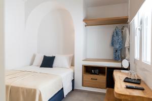Posteľ alebo postele v izbe v ubytovaní Asimina Hotel
